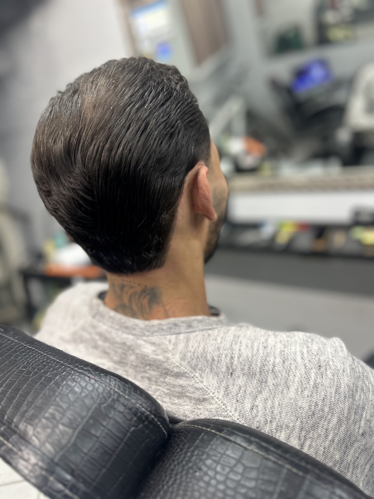 Corte alinhado, saindo da cadeira na Barbearia Montalvão